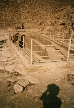 The author photographs a boat pit near the Great Pyramid